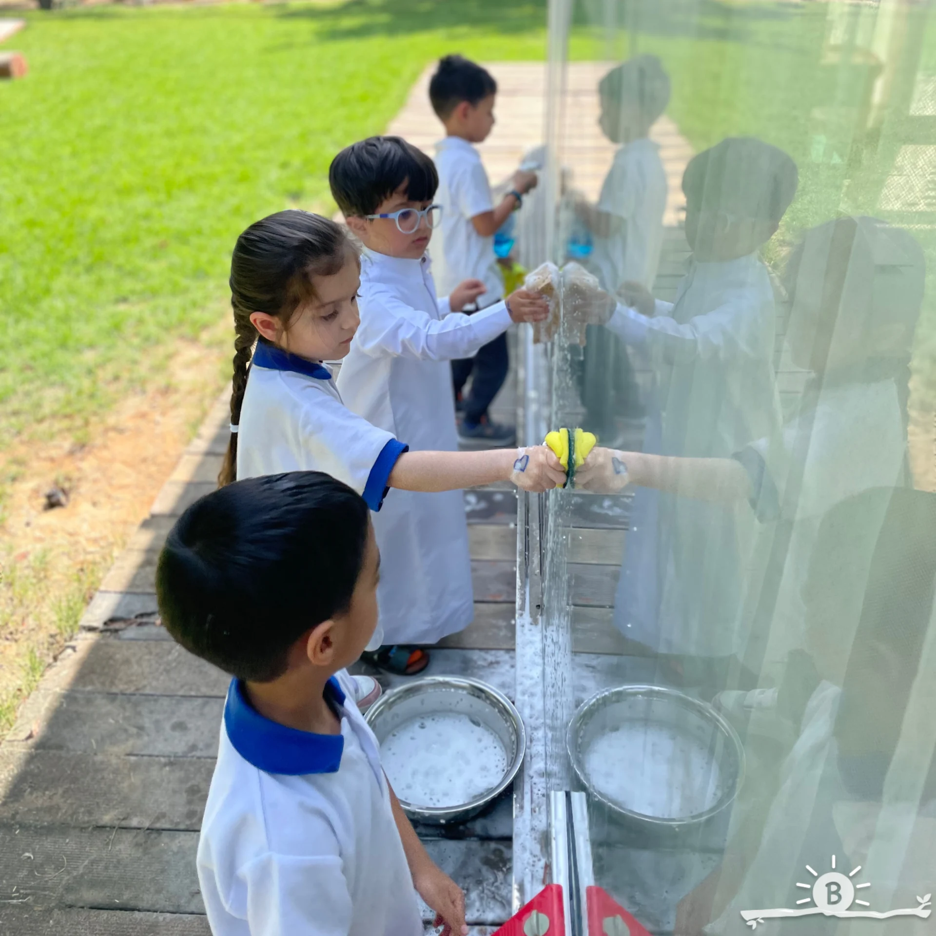 Children washing windows.