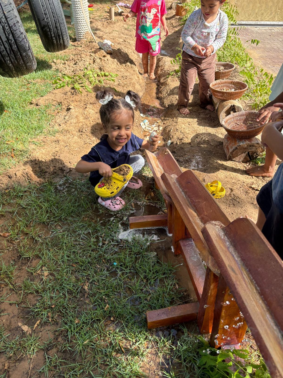 Outdoor water and sensory exploration at Beginnings Forest Montessori Dubai