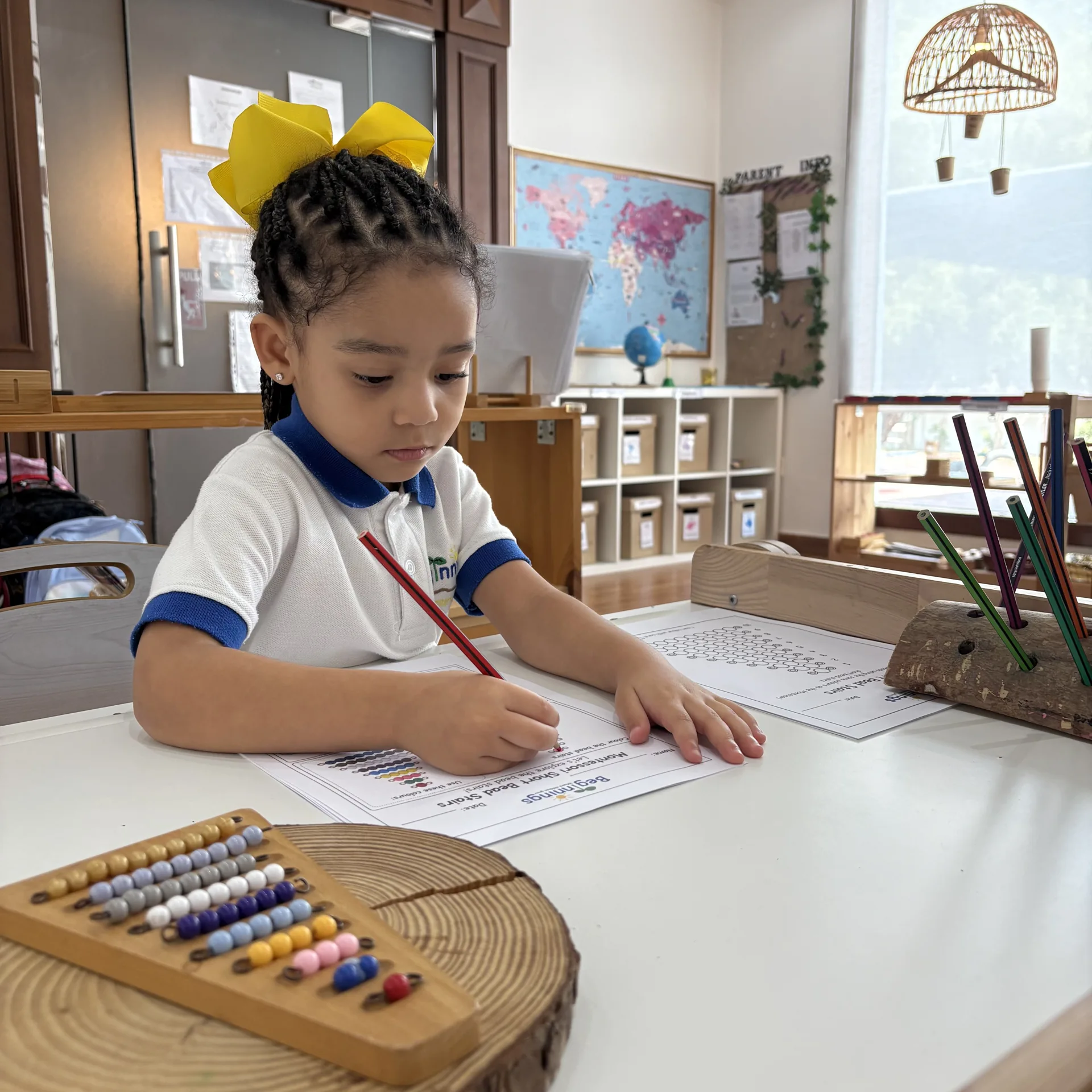 Independent maths and pencil work at Beginnings Forest Montessori in Muhaisnah, Dubai.