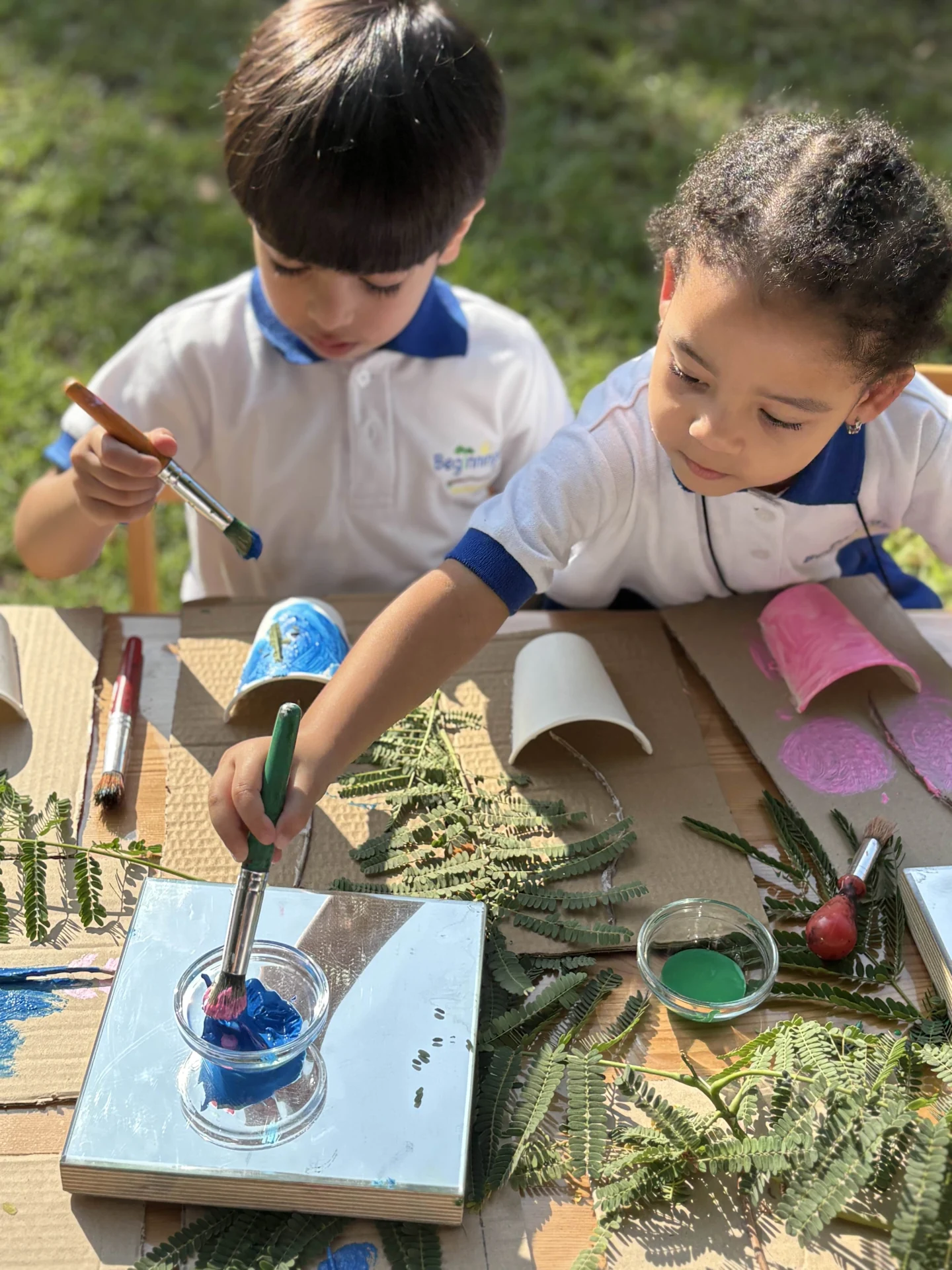 Outdoor nature and cardboard art.